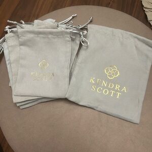 Kendra Scott Light Gray Pouches with Gold Logo